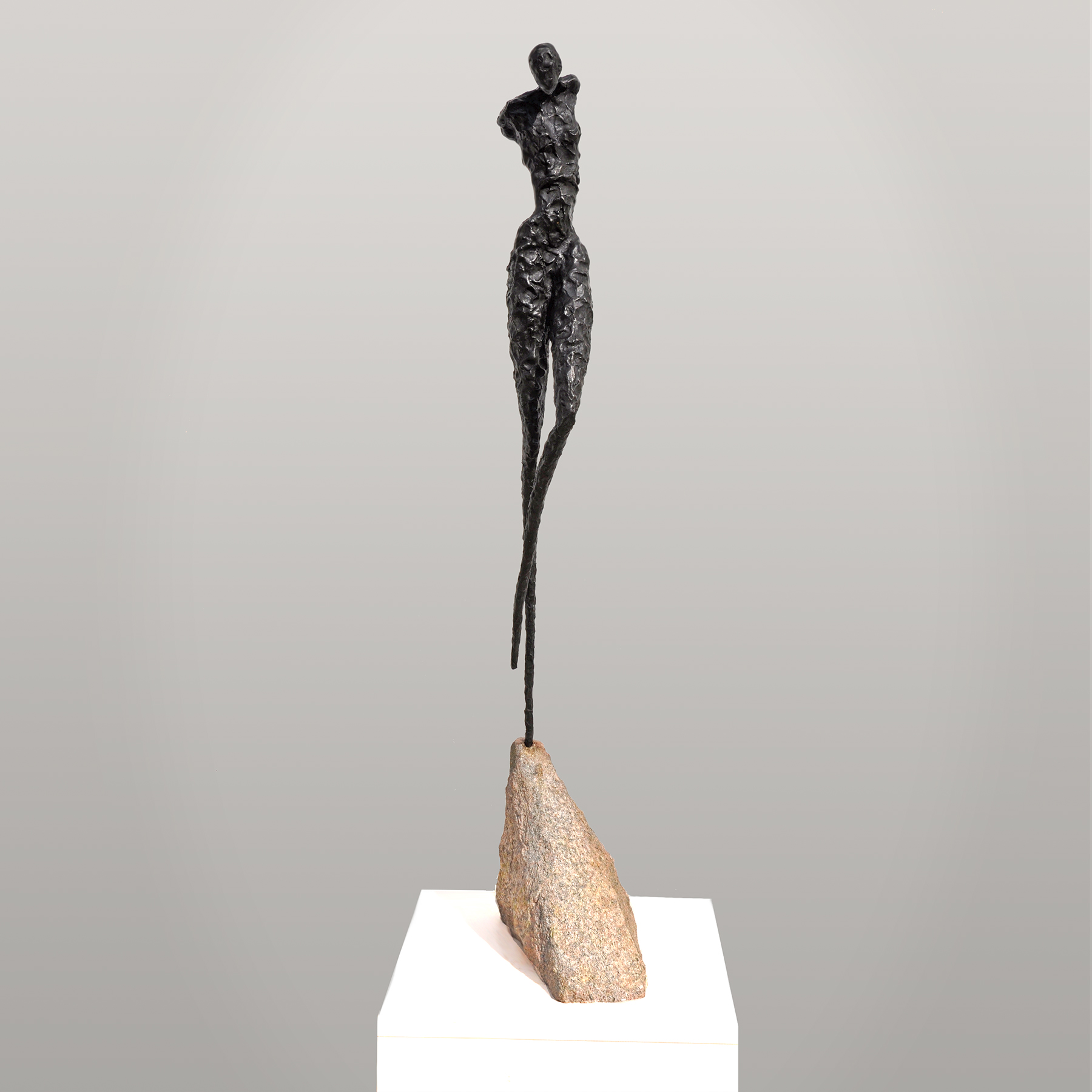 A Leap of Faith Bronze. Custom stone and patina. 40" h x 5" w x 4" d